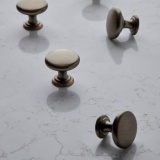 Close up product image of four Roper Rhodes Bronze Knobs with Backplates